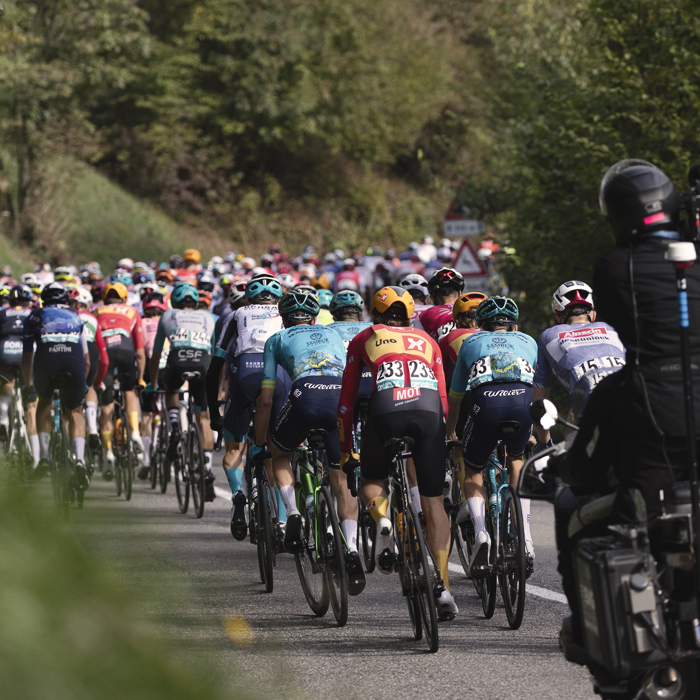 Il Lombardia 2024 - The peloton from behind as it climbs outside Dosso