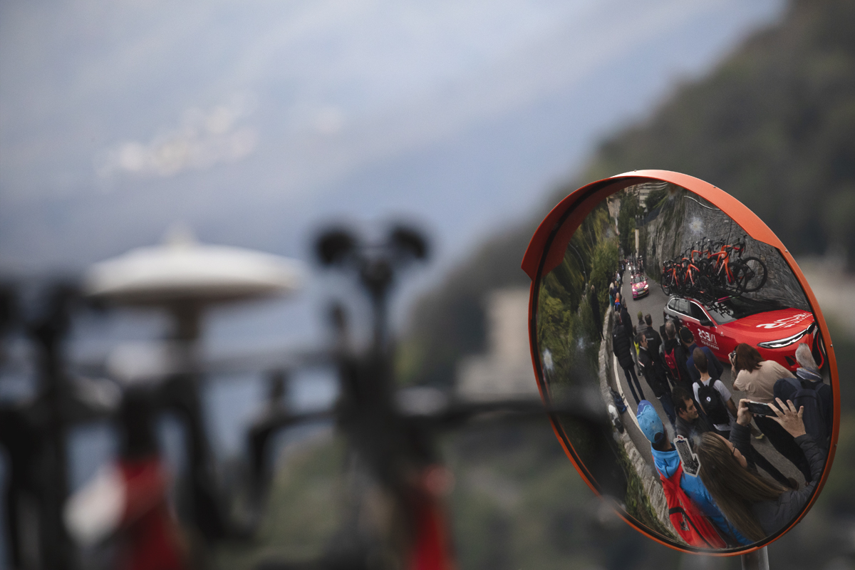 Il Lombardia 2024 - INEOS Grenadiers team car reflected in a mirror
