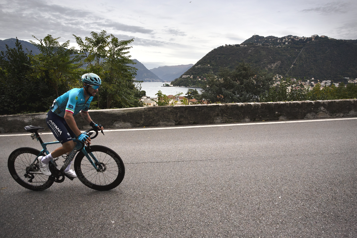 Il Lombardia 2024 - Simone Velasco of Astana Qazaqstan Team with beautiful Lake Como in the background