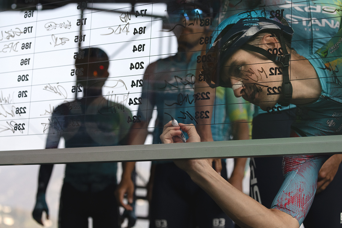 Il Lombardia 2025 - Nicola Conci of XDS Astana Team signs his name on the sign on board at the start of the race