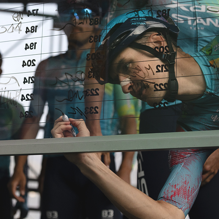 Il Lombardia 2025 - Nicola Conci of XDS Astana Team signs his name on the sign on board at the start of the race