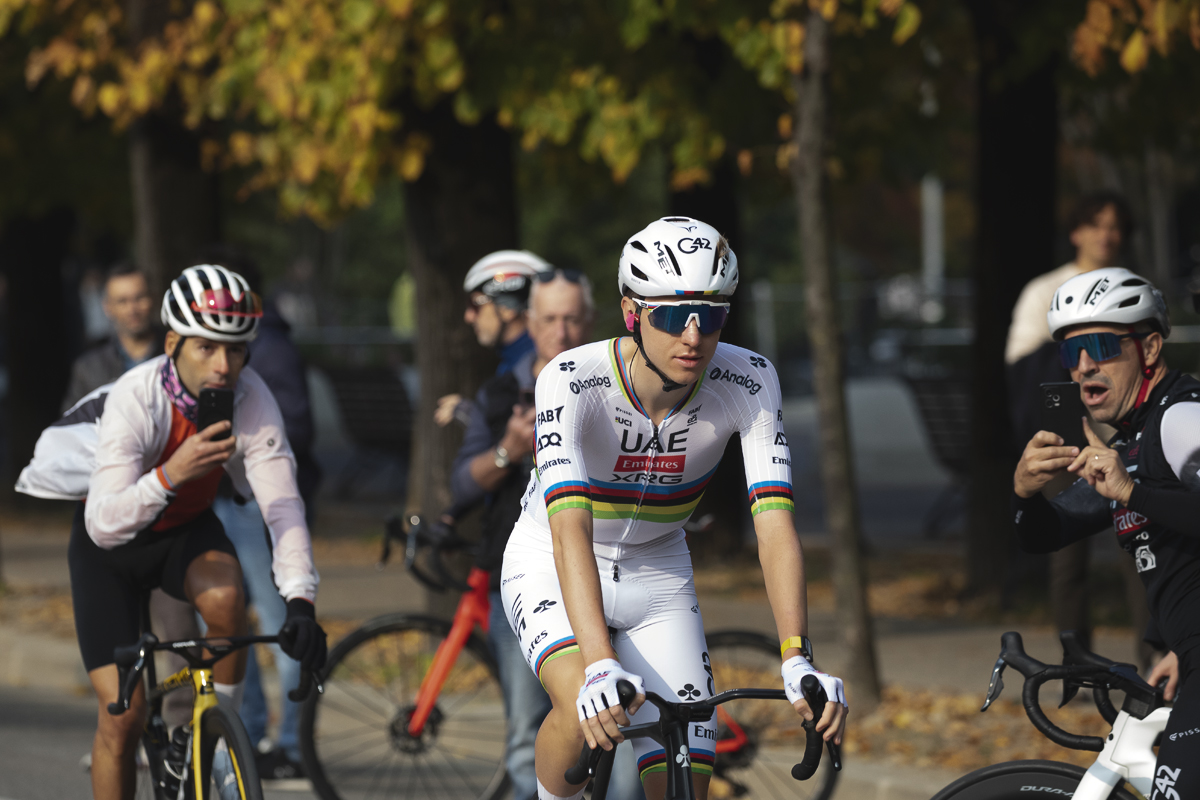 Il Lombardia 2025 - Tadej Pogačar is filmed by a number of fans as he makes his way to the team presentation