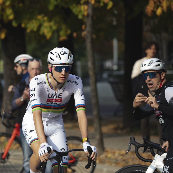 Il Lombardia 2025 - Tadej Pogačar is filmed by a number of fans as he makes his way to the team presentation