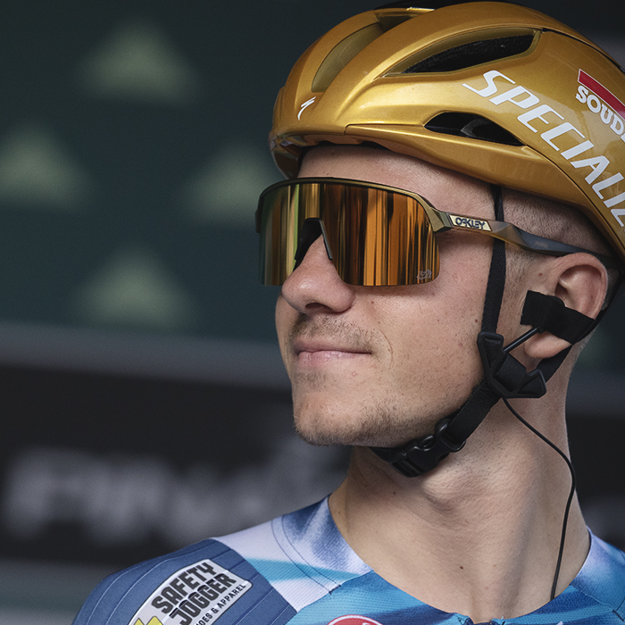 Il Lombardia 2025 - Remco Evenepoel wearing his Olympic Champions’ golden helmet on the podium at the beginning of the race