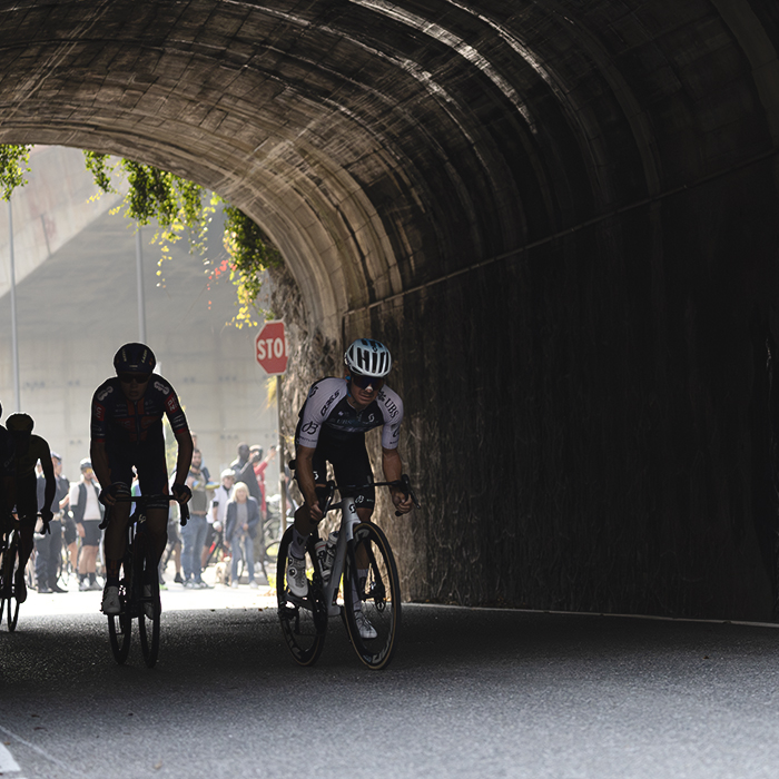 Il Lombardia 2025 - Xabier Mikel Azparren leads a group of riders out of a tunnel in Ponti