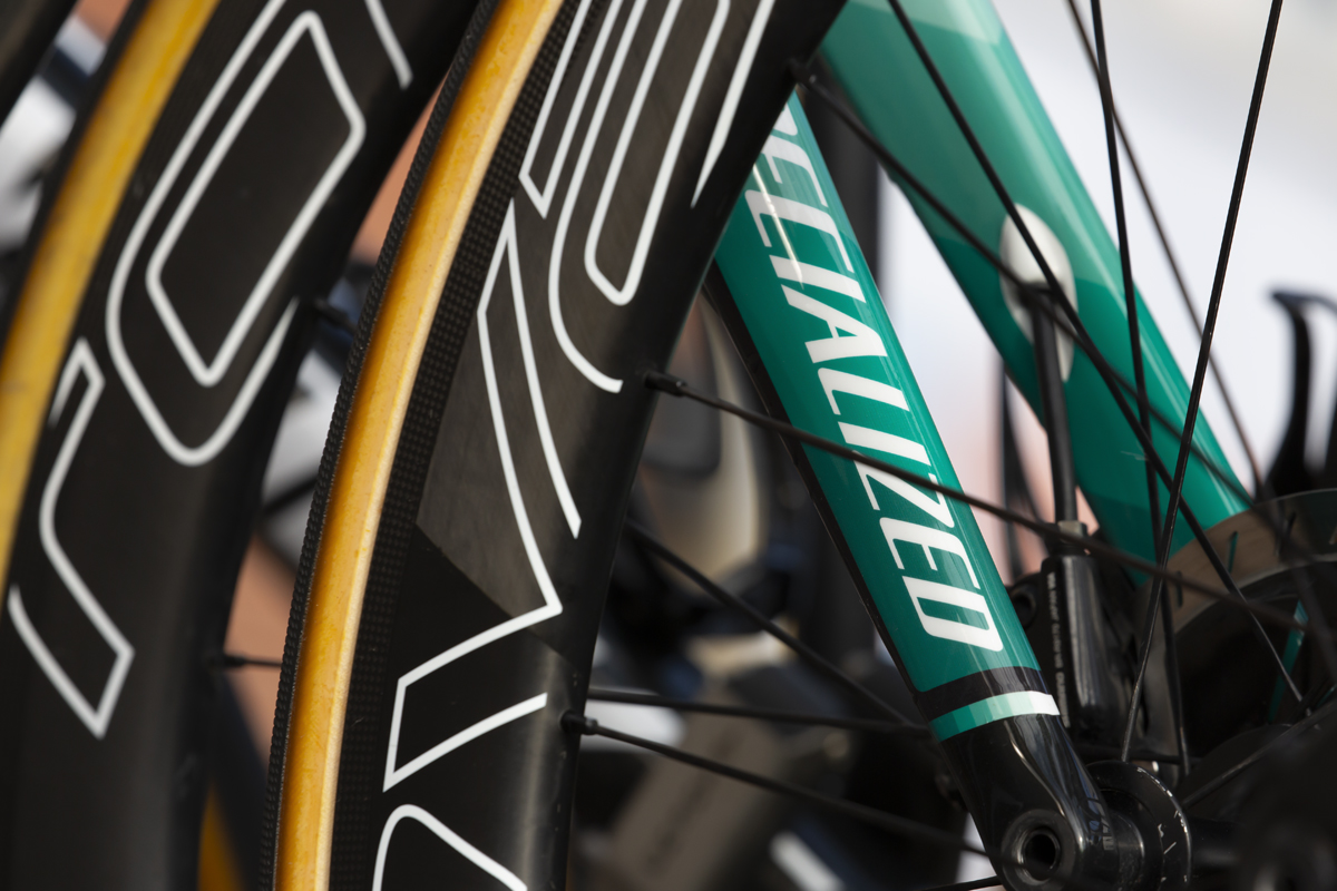 Kuurne Brussel Kuurne 2020 - close up of a Specialised bike through a wheel of the Bora-Hansgrohe team