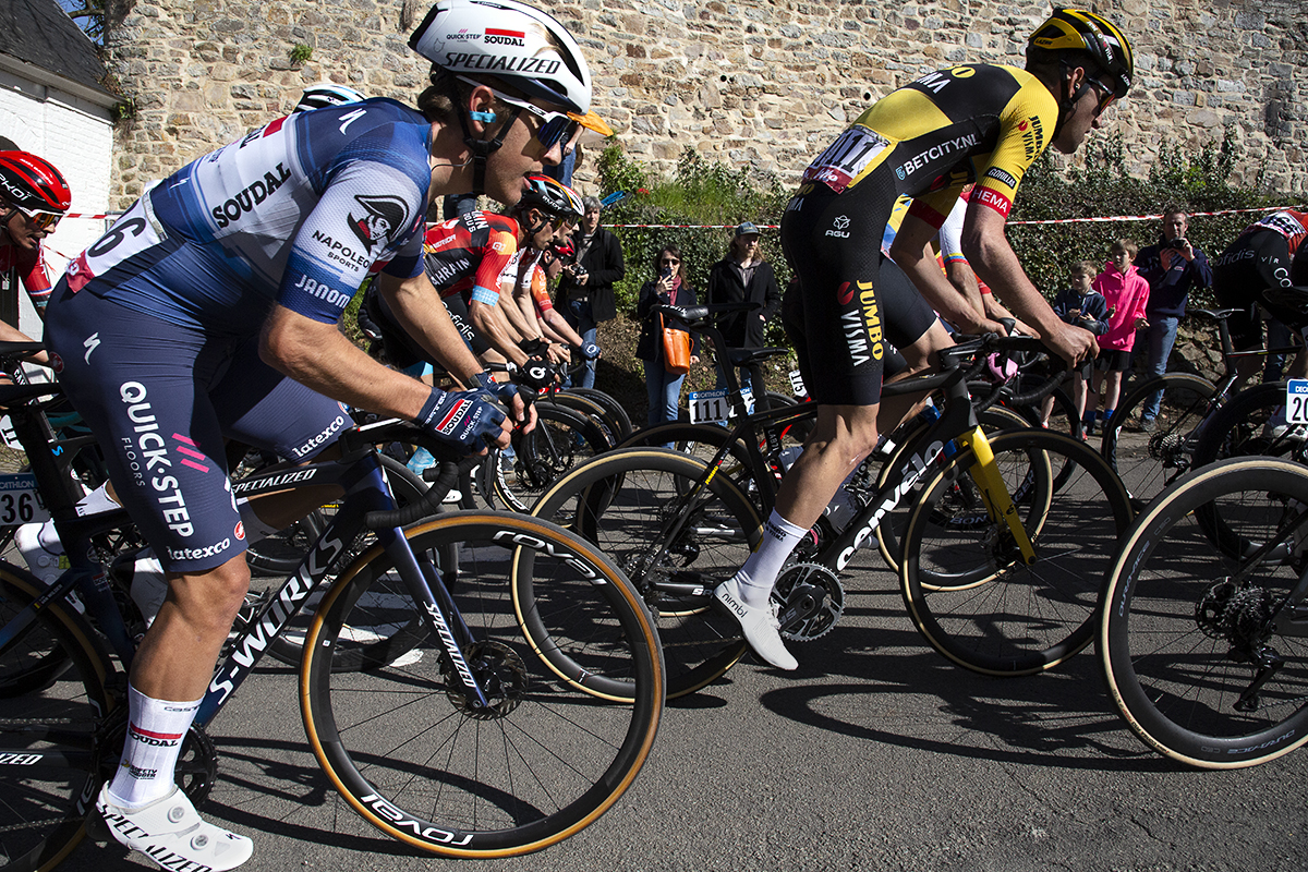 La Flèche Wallonne 2023  - Side on shot of Tiesj Benoot of Jumbo-Visma ascending the Mur de Huy