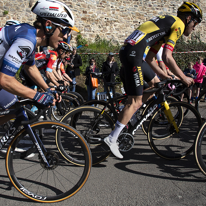 La Flèche Wallonne 2023  - Side on shot of Tiesj Benoot of Jumbo-Visma ascending the Mur de Huy