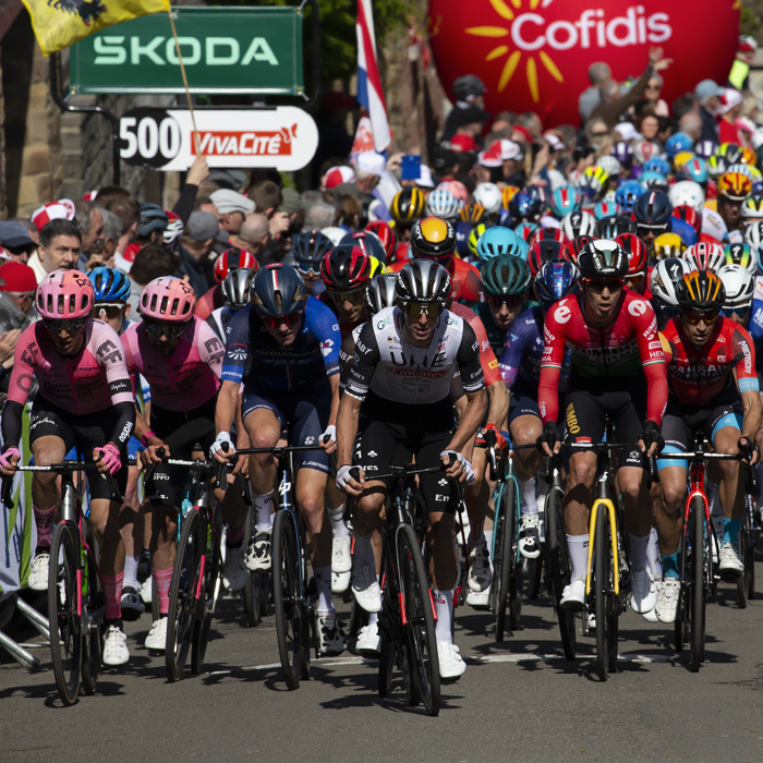 La Flèche Wallonne 2023 - The peloton ascend the Huy led by George Bennett of UAE Team Emirates