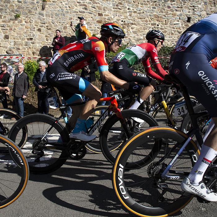 La Flèche Wallonne 2023 - Gino Mäder of Bahrain Victorious ascends the Mur de Huy