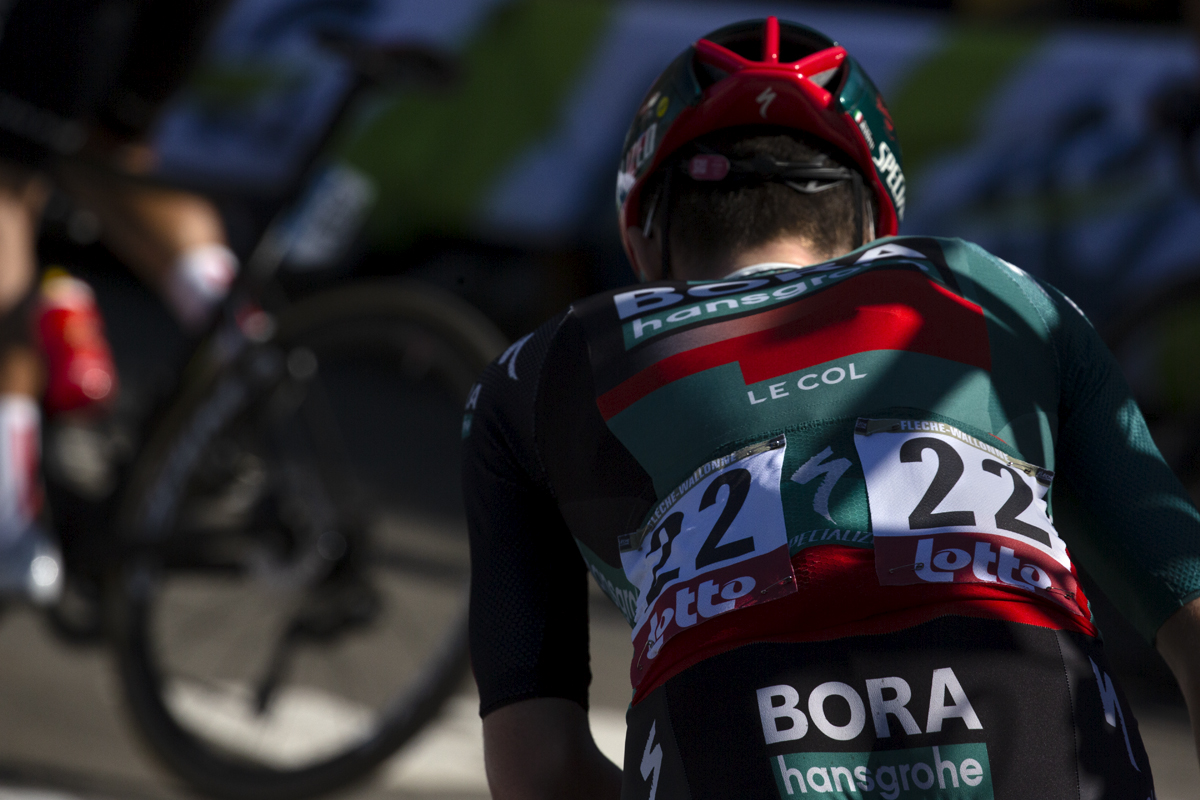 La Flèche Wallonne 2023 - Shot from behind of Giovanni Aleotti of BORA - hansgrohe climbing the Mur de Huy