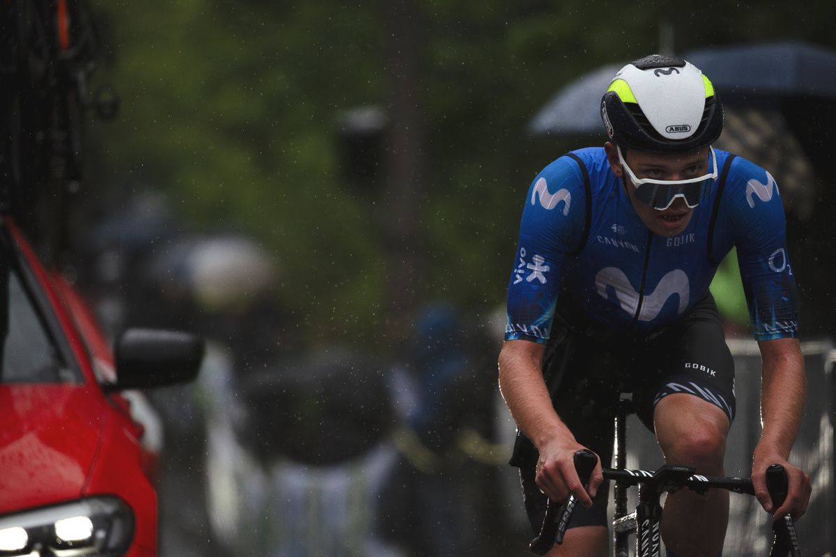 La Flèche Wallonne 2024 - Iván Romeo of Movistar Team looks over his glasses to see through the rain as he climbs the Mur de Huy