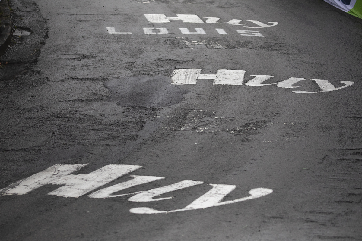 La Flèche Wallonne 2025 - Huy written on the road on Mur de Huy