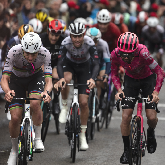 La Flèche Wallonne 2025 - Tadej Pogačar puts his sunglasses in his mouth as he prepares to attack on the Mur de Huy
