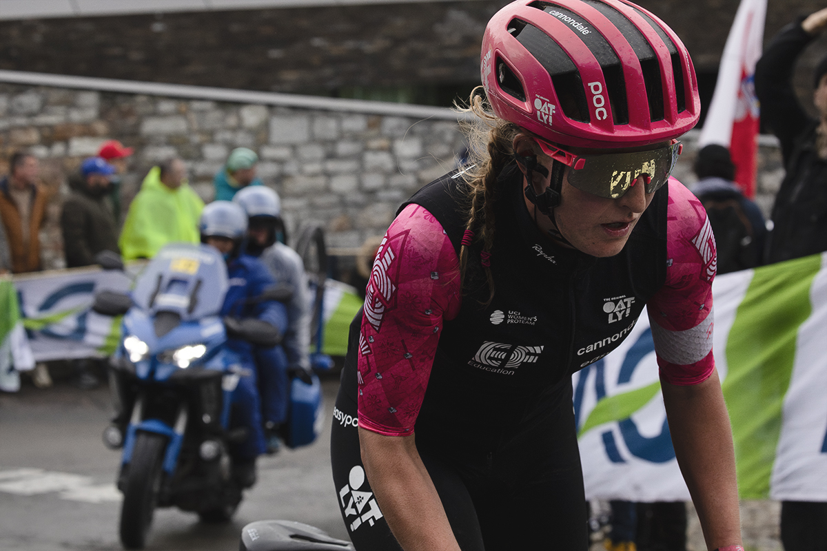 La Flèche Wallonne Femmes 2025 - Cédrine Kerbaol, the word Huy reflected in her glasses from the writing on the road