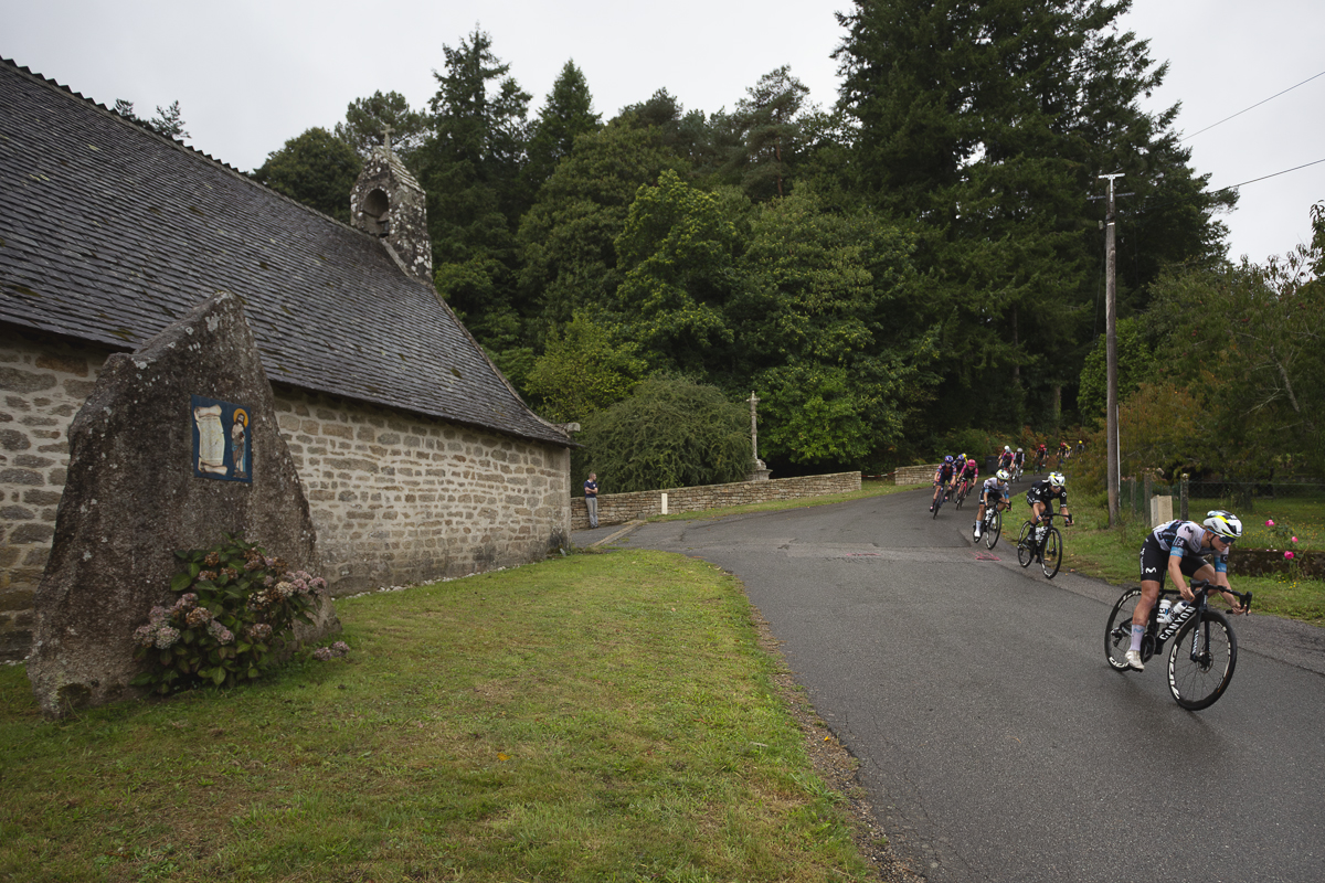 Classic Lorient Agglomération - Ceratizit 2025 - Riders pass in front of the small stone built Chapelle Saint-Jean du Temple