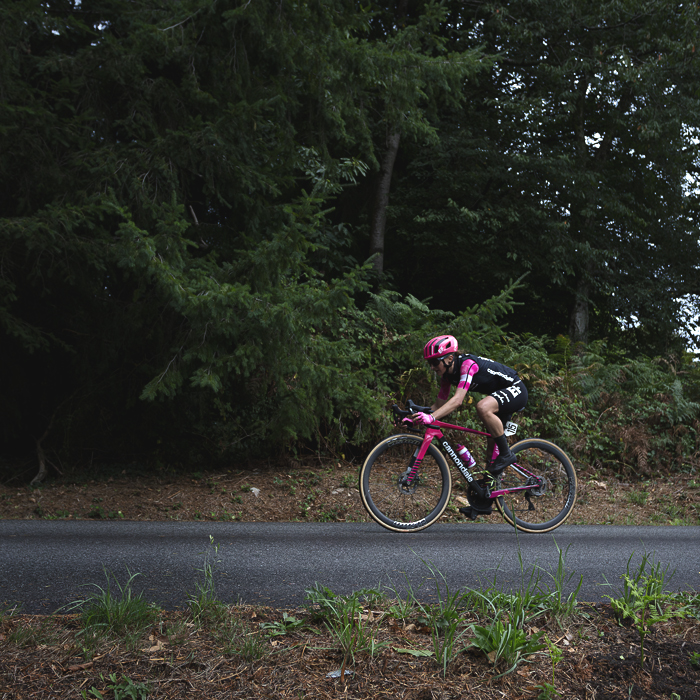 Classic Lorient Agglomération - Ceratizit 2025 - Magdeleine Vallieres of EF Education-Oatly cycles down a wooded section of the course