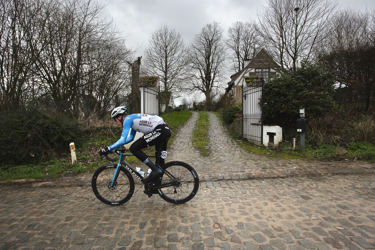 Omloop Het Nieuwsblad 2024 - Sander de Pestel of Decathlon AG2R La Mondiale Team passes a gateway on Haaghoek