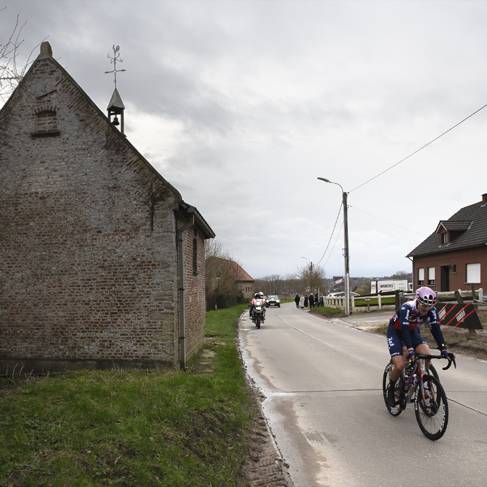 Omloop Het Nieuwsblad Vrouwen 2024 - Jeanne Korevaar of Liv AlUla Jayco, passes a chapel on Kapellestraat