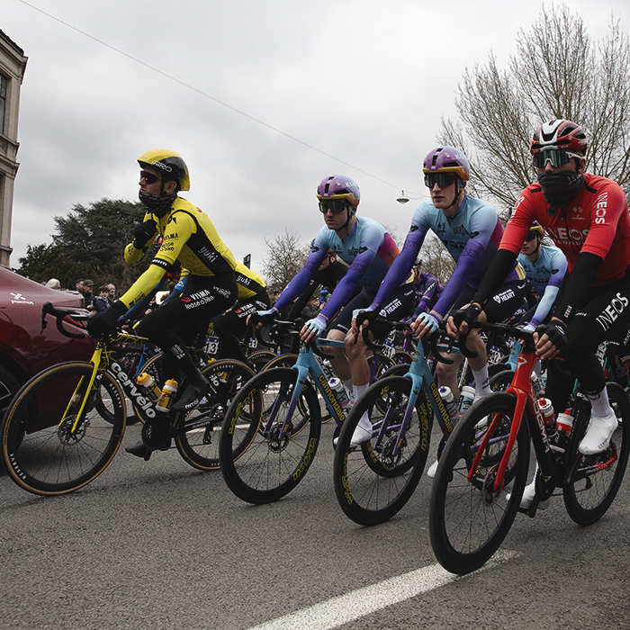 Omloop Nieuwsblad 2025 - A peloton dressed for the cold rolls out in Gent