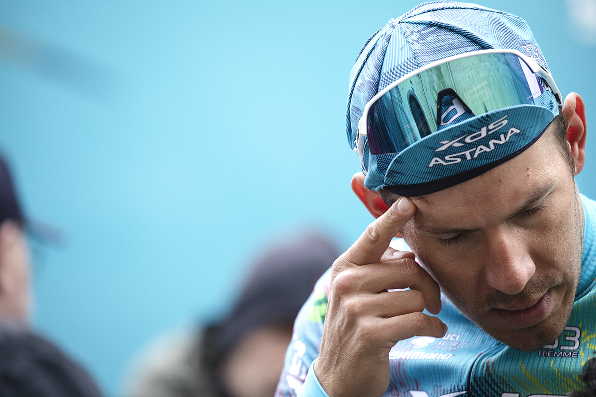 Omloop Nieuwsblad 2025 - Davide Ballerini of XDS Astana Team puts his finger to his temple before the start of the race