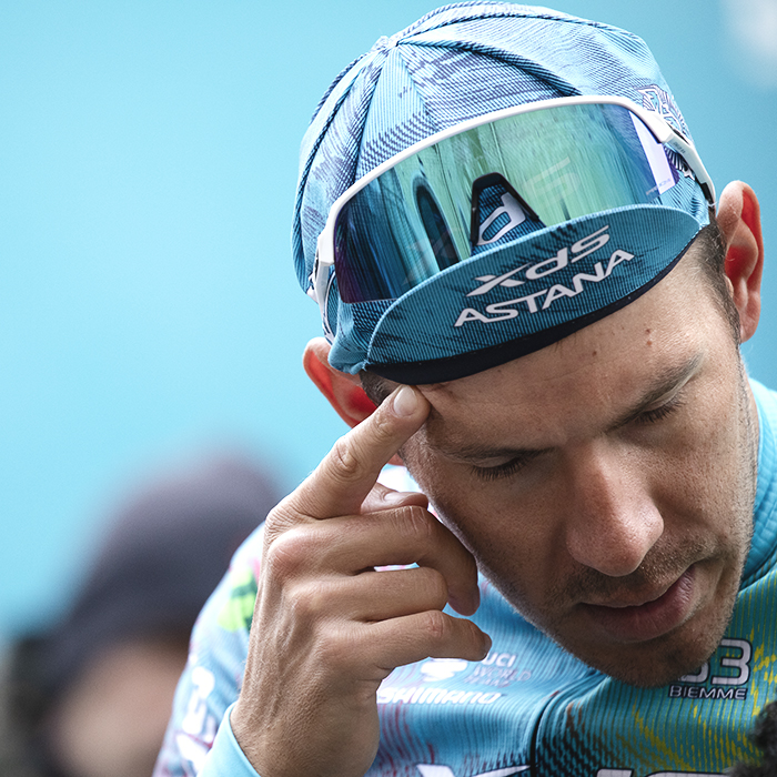 Omloop Nieuwsblad 2025 - Davide Ballerini of XDS Astana Team puts his finger to his temple before the start of the race