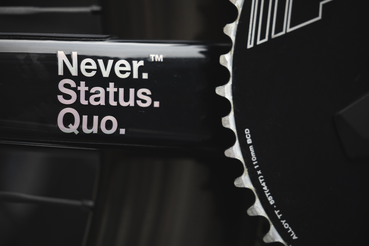 Omloop Nieuwsblad 2025 - Factor motto on crank arm - Never. Status. Quo.