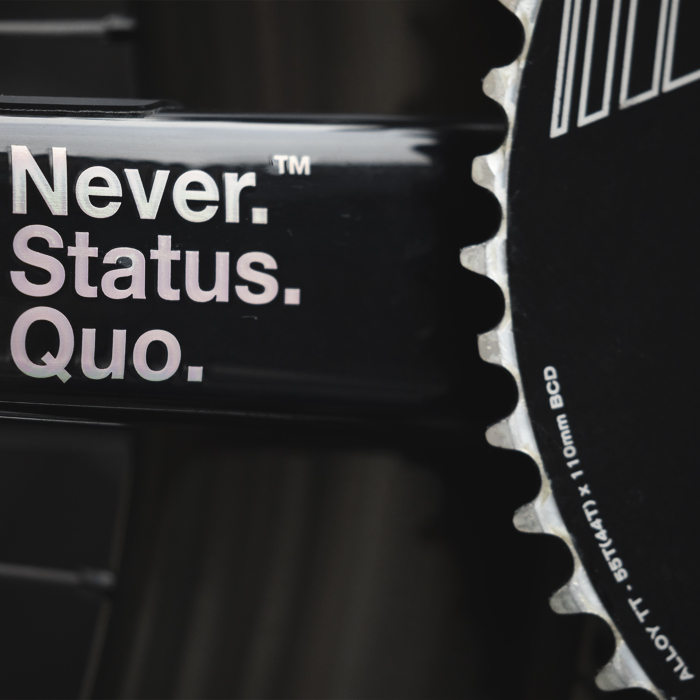 Omloop Nieuwsblad 2025 - Factor motto on crank arm - Never. Status. Quo.