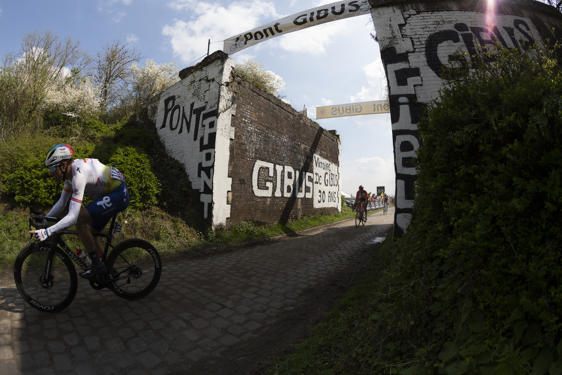 Paris Roubaix 2023 - Edvald Boasson Hagen passes through the broken railway bridge of Pont Gibus