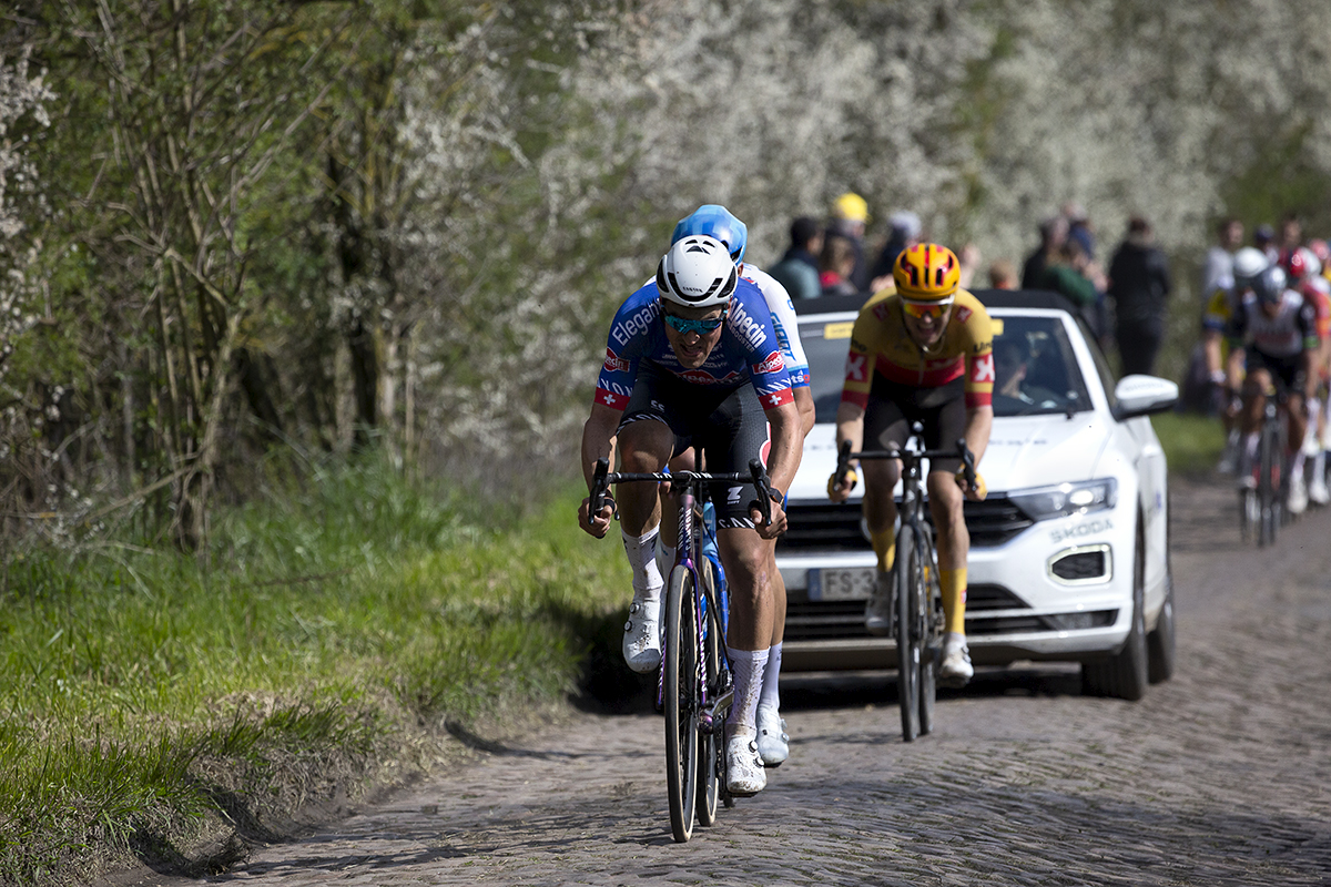 Paris Roubaix 2023 - Silvan Dillier of Alpecin-Deceuninck pursues the main group followed by a team car