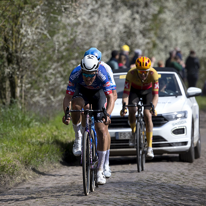 Paris Roubaix 2023 - Silvan Dillier of Alpecin-Deceuninck pursues the main group followed by a team car