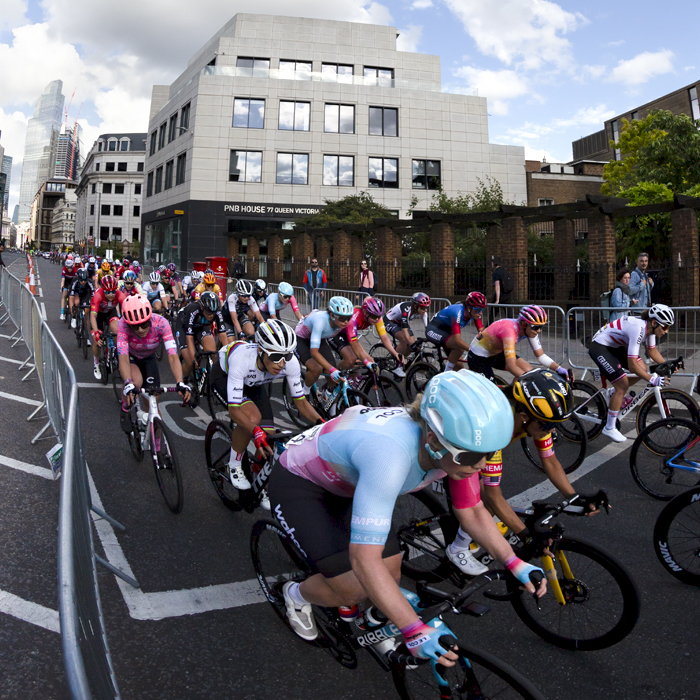 RideLondon Classique 2022 - The peloton ride down Queen Victoria Street