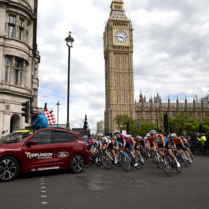 RideLondon Classique 2022 - The Race Directors car prepares to officially start the race as it passes the Houses of Parliament in Westminster