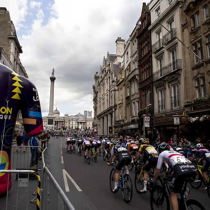 RideLondon Classique 2022 - Riders make their way to Trafalgar Square with an inflatable race jersey in the foreground