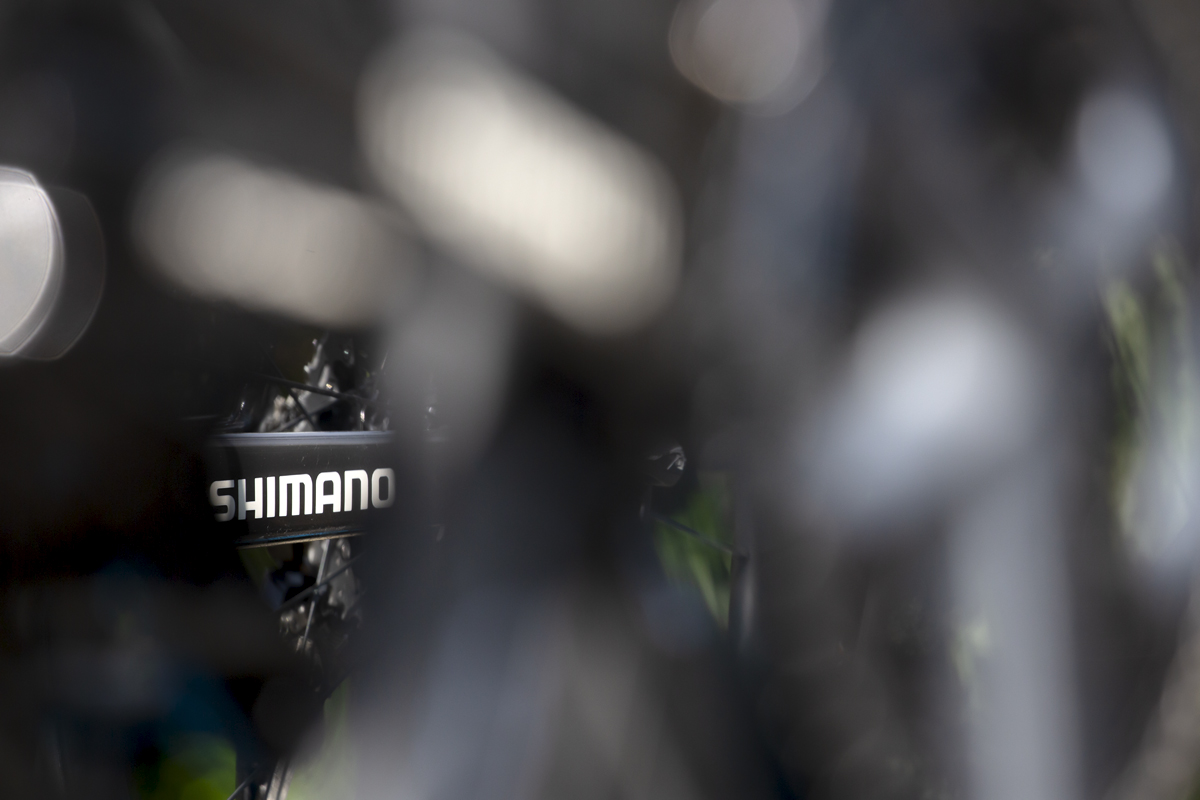 RideLondon Classique 2022 - Close up of the Shimano logo through bike wheels