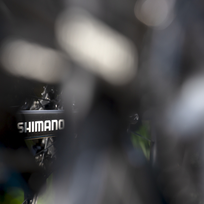 RideLondon Classique 2022 - Close up of the Shimano logo through bike wheels