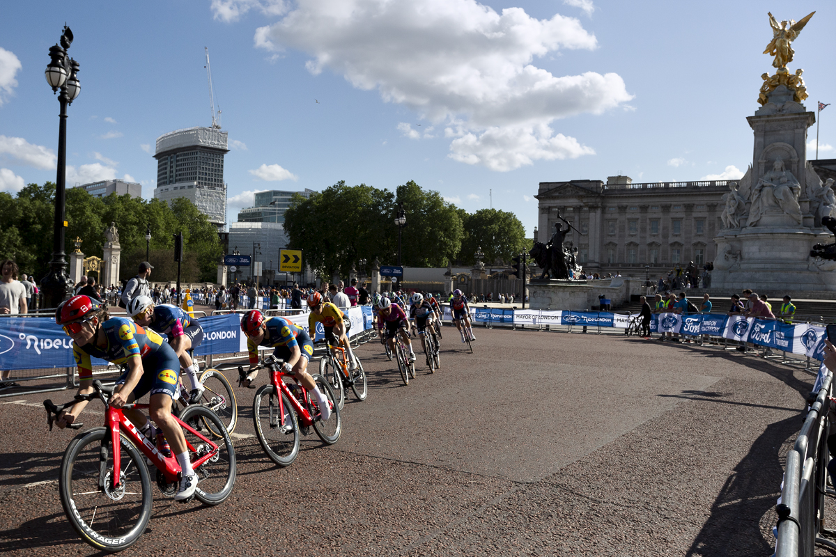 RideLondon Classique 2024 - Lizzie Deignan leads a group of riders onto The Mall