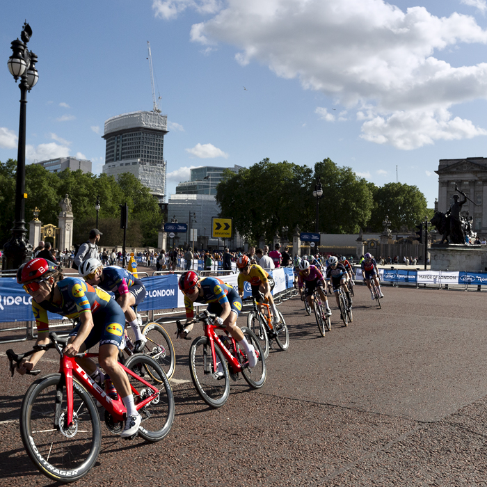 RideLondon Classique 2024 - Lizzie Deignan leads a group of riders onto The Mall