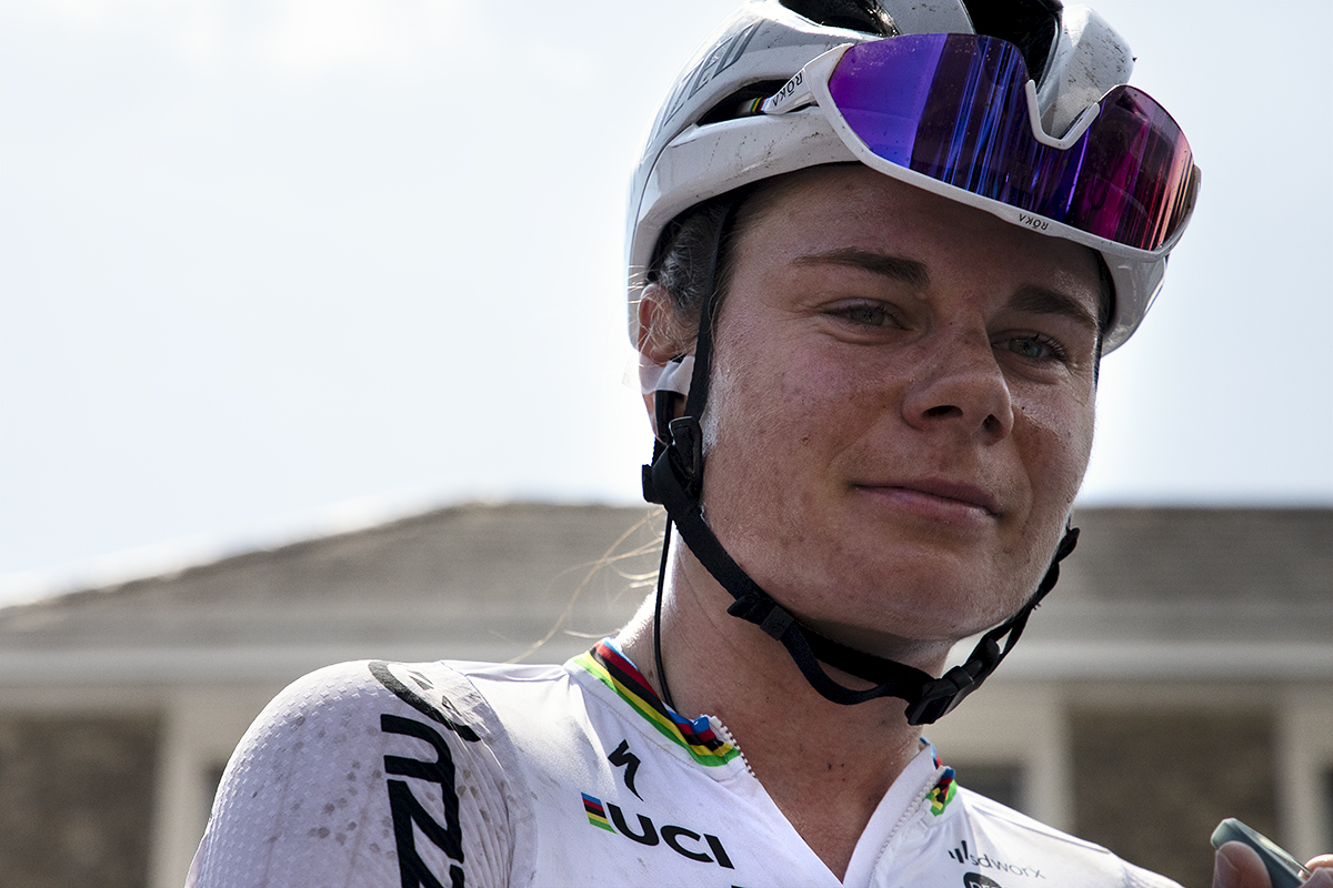 RideLondon Classique 2024 - Lotte Kopecky wearing her world champions jersey looks into the camera