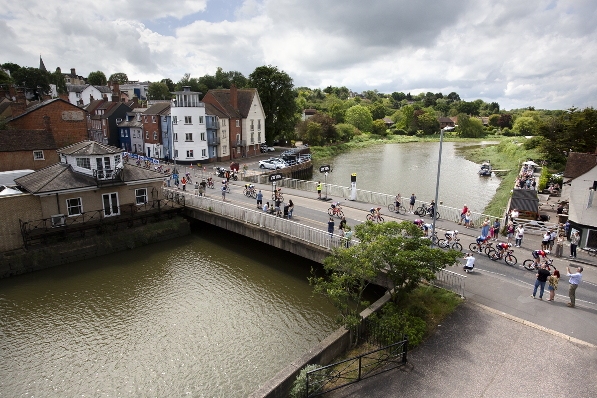 RideLondon Classique 2024 - Riders cross a bridge over the River Chelmer in Maldon