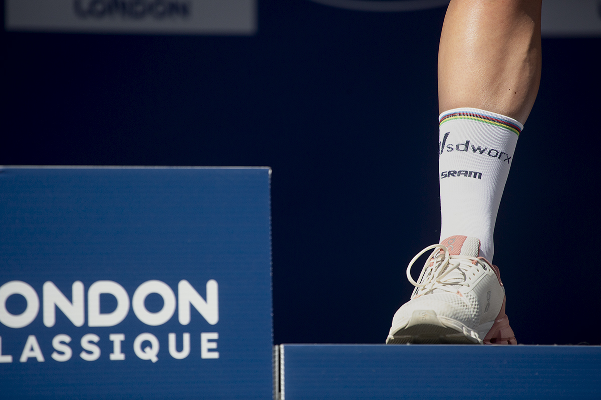 RideLondon Classique 2024 - Lotte Kopecky’s foot on the podium with her World Champion’s bands on her sock