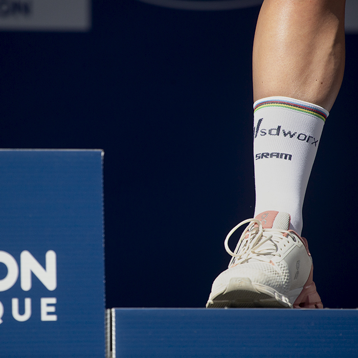 RideLondon Classique 2024 - Lotte Kopecky’s foot on the podium with her World Champion’s bands on her sock