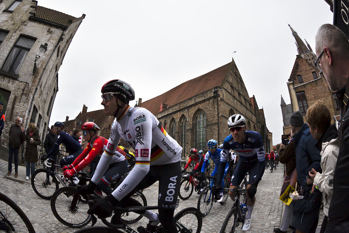 Ronde van Vlaanderen 2023 - Nils Politt of BORA - hansgrohe, Tim Declercq of Soudal - Quick Step and Trek - Segafredo’s Mads Pedersen cross the Mariabrug on their way out of Brugge