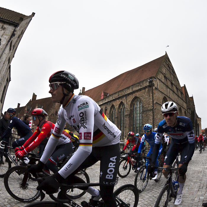 Ronde van Vlaanderen 2023 - Nils Politt of BORA - hansgrohe, Tim Declercq of Soudal - Quick Step and Trek - Segafredo’s Mads Pedersen cross the Mariabrug on their way out of Brugge