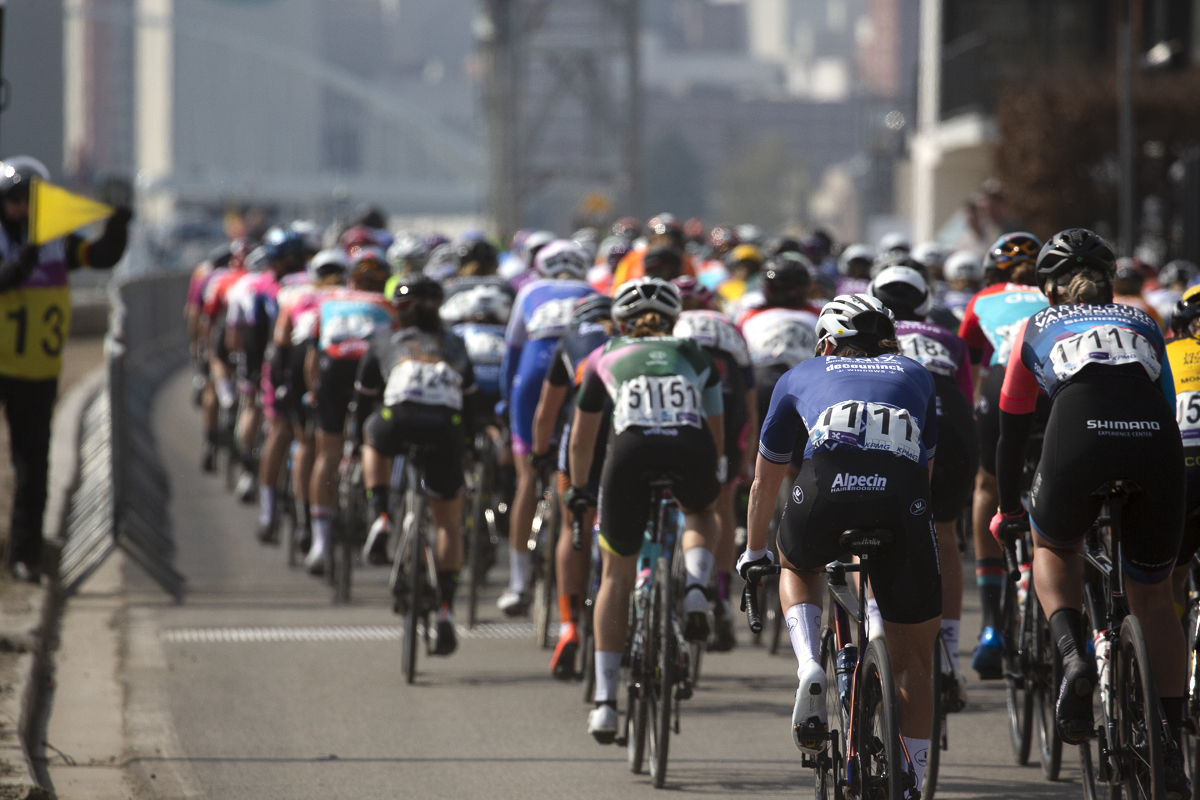 Scheldeprijs 2023 Vrouwen - A view of the back of the women’s peloton as it rides down the side of the Albertkanaal