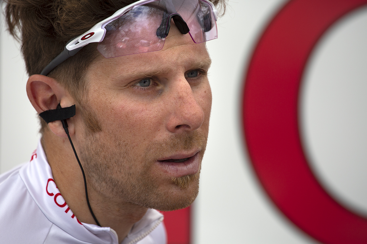 Tour de Yorkshire 2019 - Filippo Fortin with his sunglasses pushed onto his forehead outside the Cofidis bus