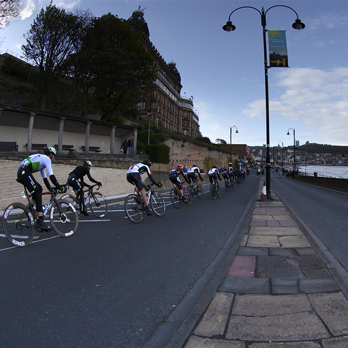 Tour de Yorkshire 2019 - riders make their way past the Grand Hotel in Scarborough