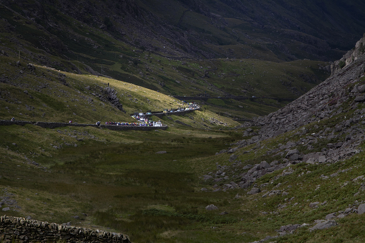 Tour of Britain 2015 - Distant shot of the peloton ascending Pen-y-Pass