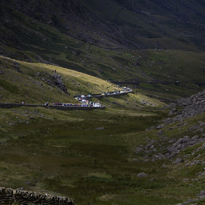 Tour of Britain 2015 - Distant shot of the peloton ascending Pen-y-Pass