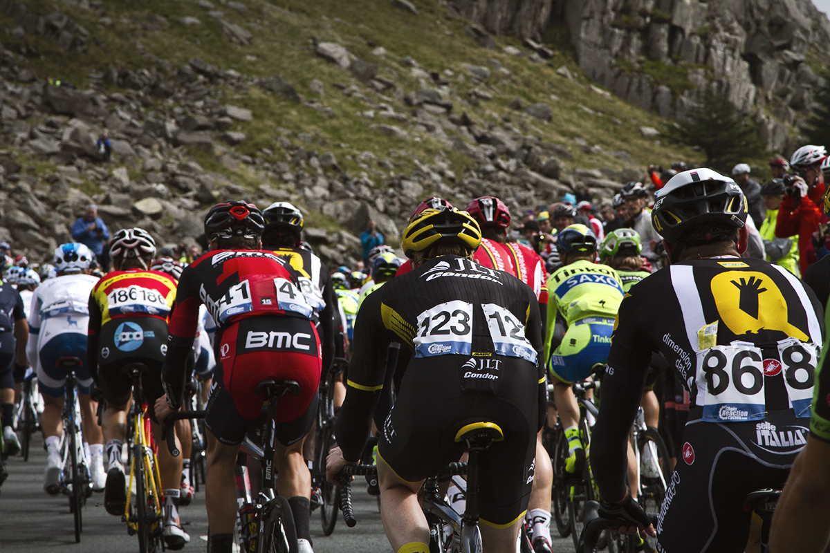 Tour of Britain 2015 - rear of the peloton climbs Pen-y-Pass